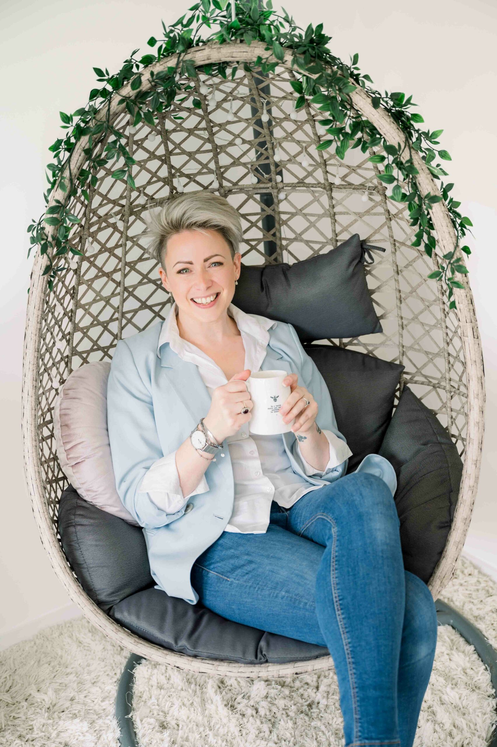 Personal Brand Photography Woman drinking coffee in a swinging chair